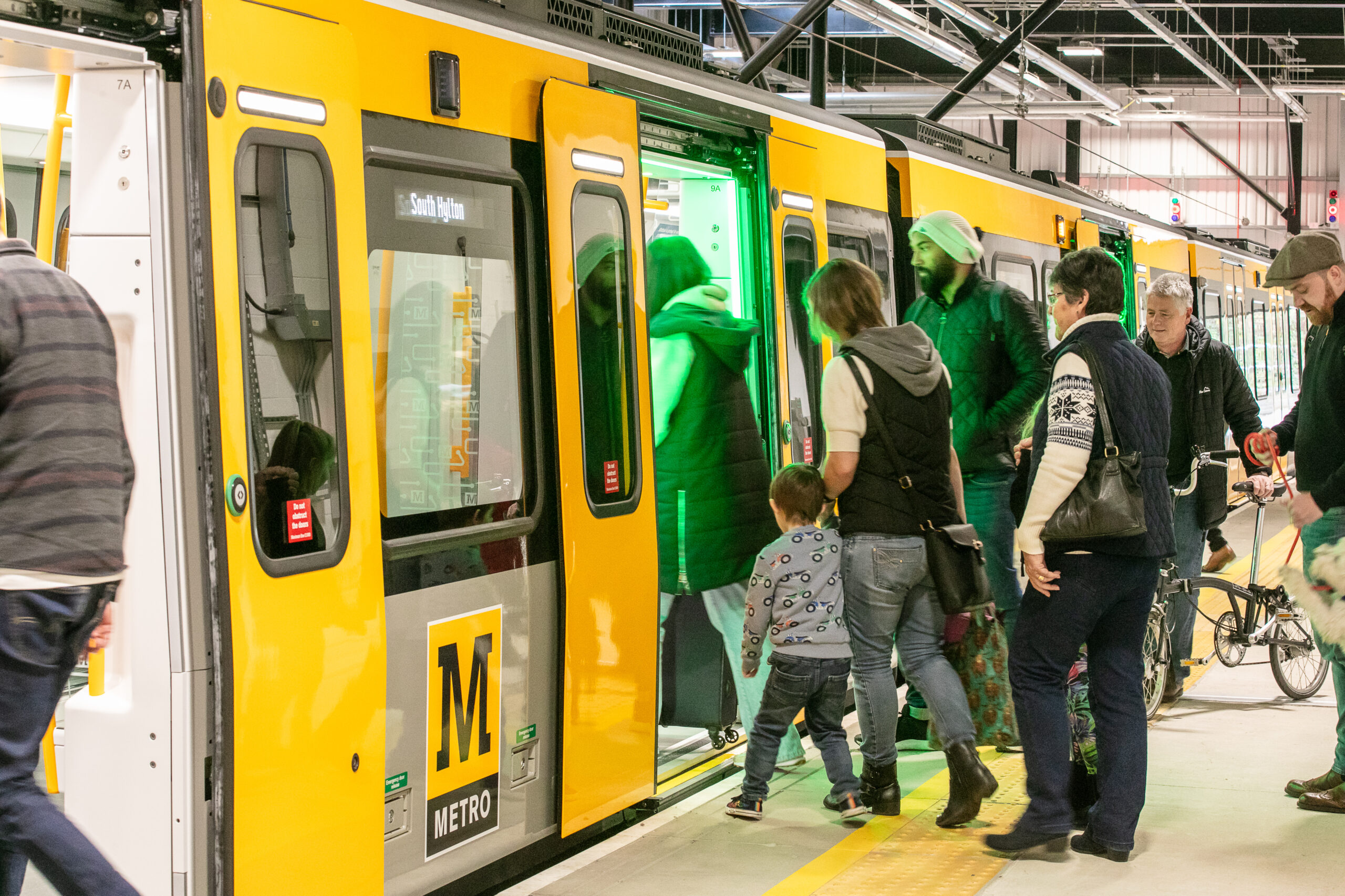 People boarding new Metro